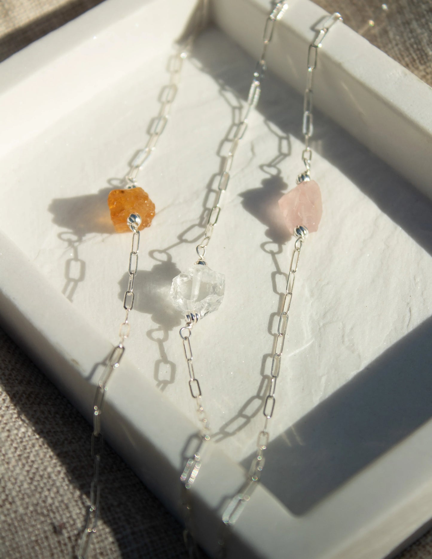 Sterling silver chain necklaces with raw citrine, quartz, and rose quartz gemstones