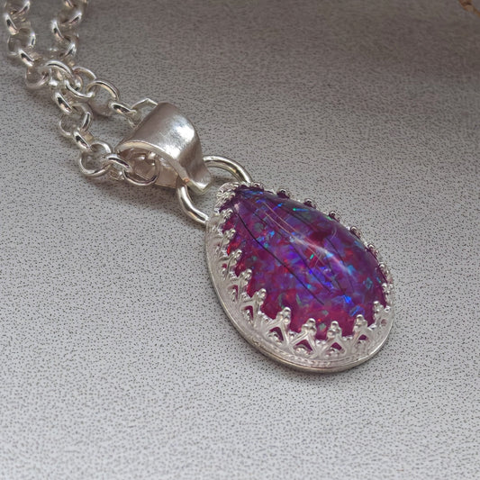 Pet hair memorial keepsake necklace.
